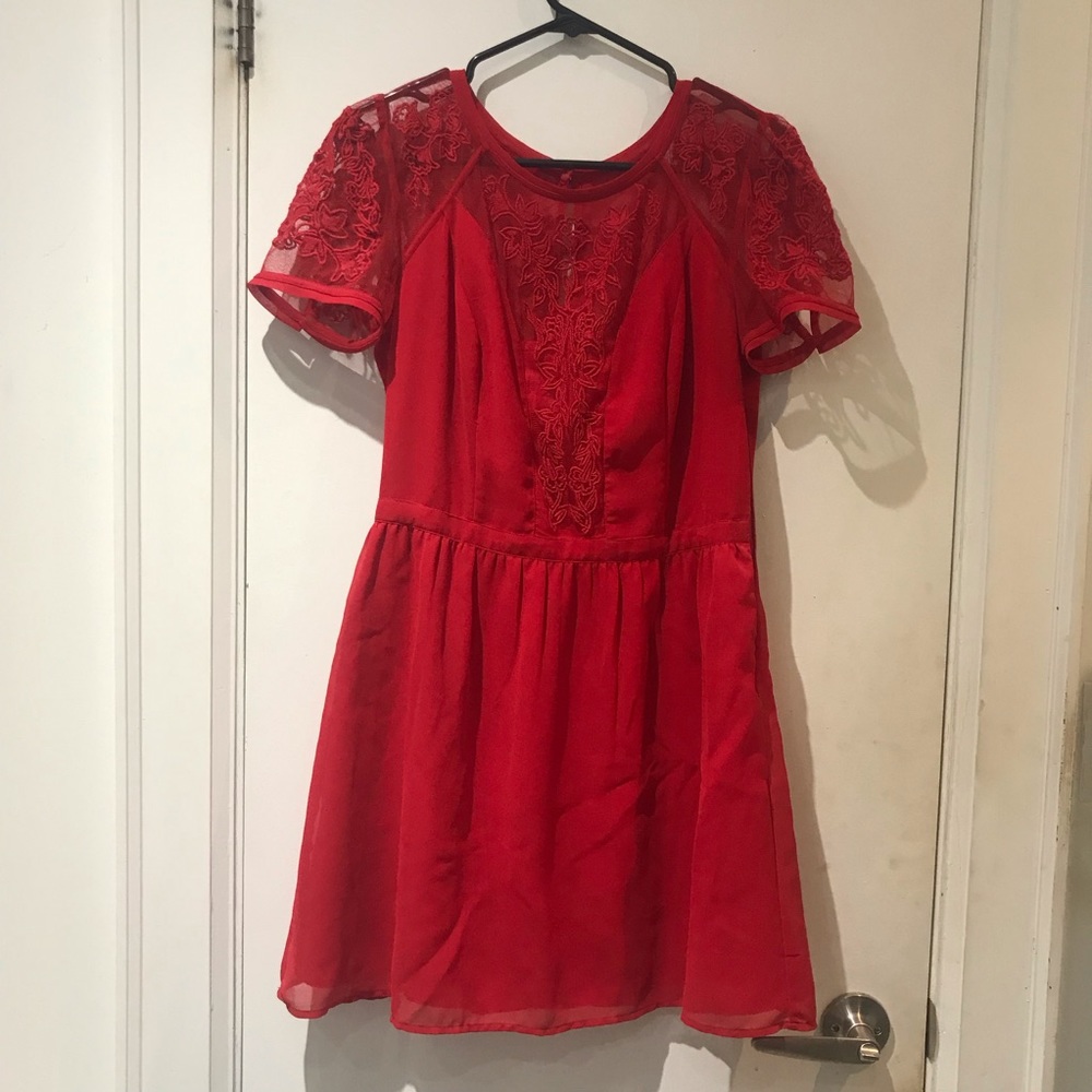 Red Dress with Sheer Décolletage